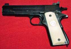 1911 45 ACP w/natural ivory factory grips